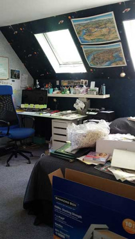 cluttered home office